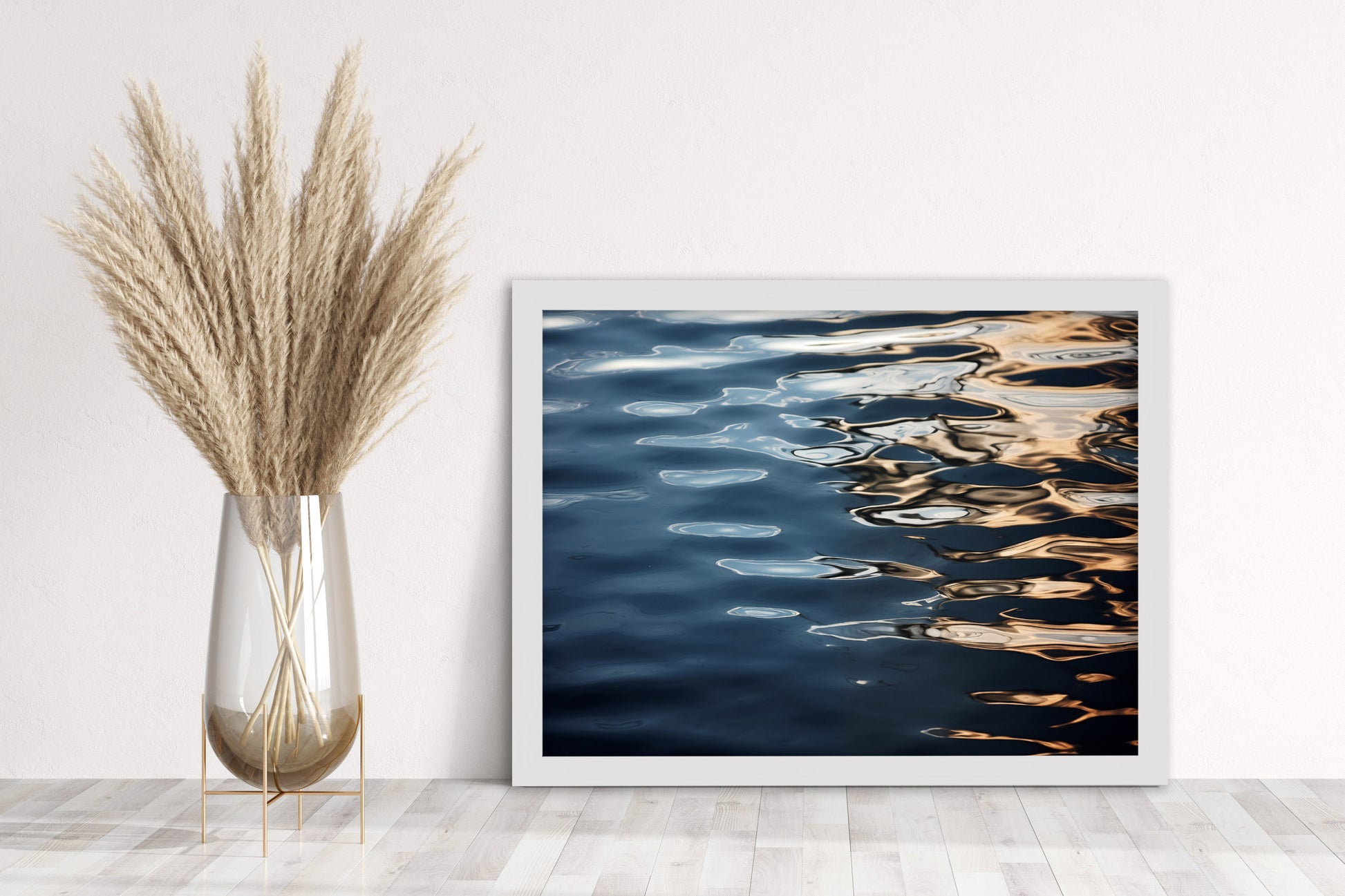 Golden Hour on the Water Realism Painting Framed Wall Art Print in Living Room Setting in white frame leaning against wall