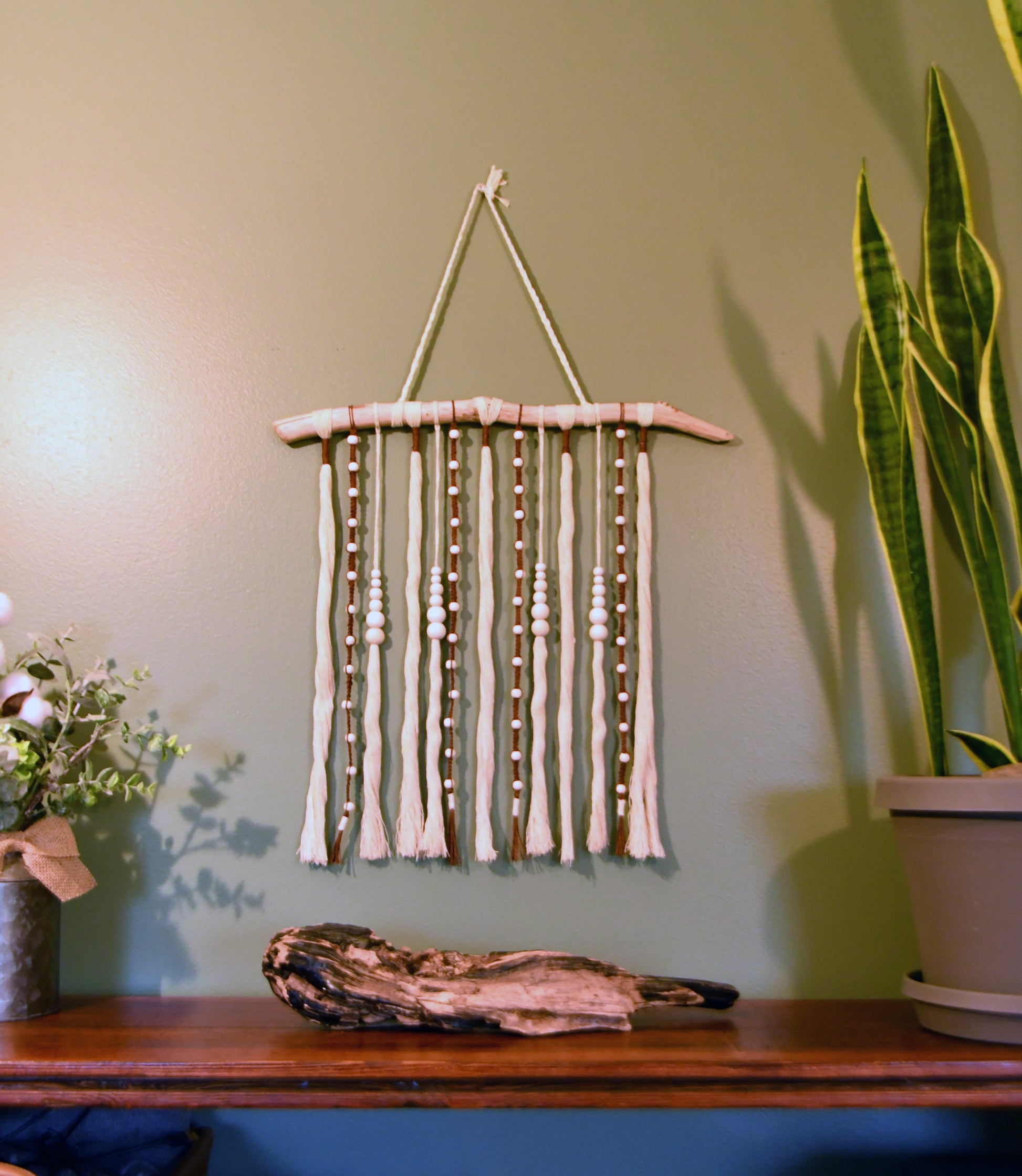 Artisanal Macramé and Driftwood Wall Hanging Texture Wall Art in bedroom setting