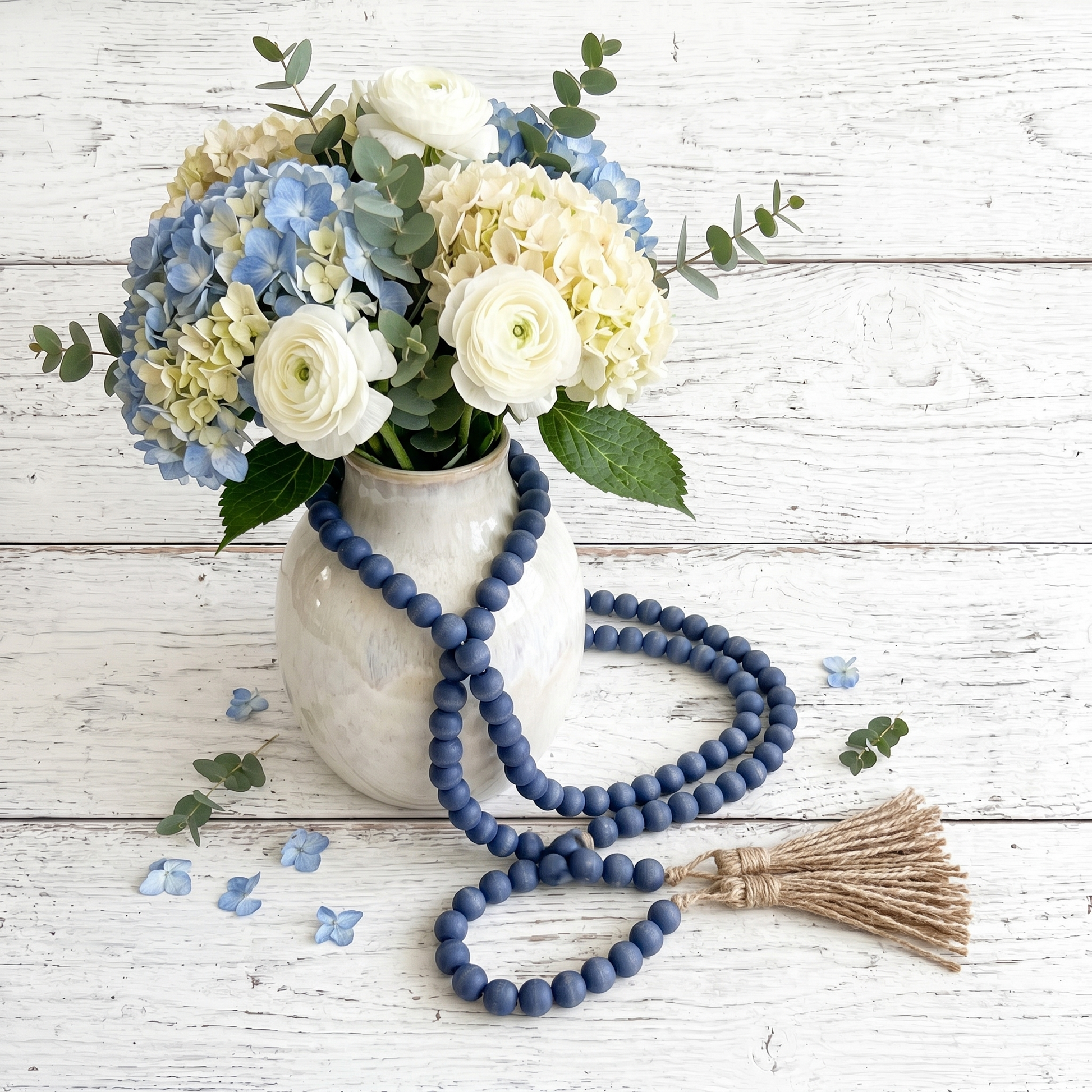 Navy Blue Wood Bead Garland (1) displayed with flower arrangement
