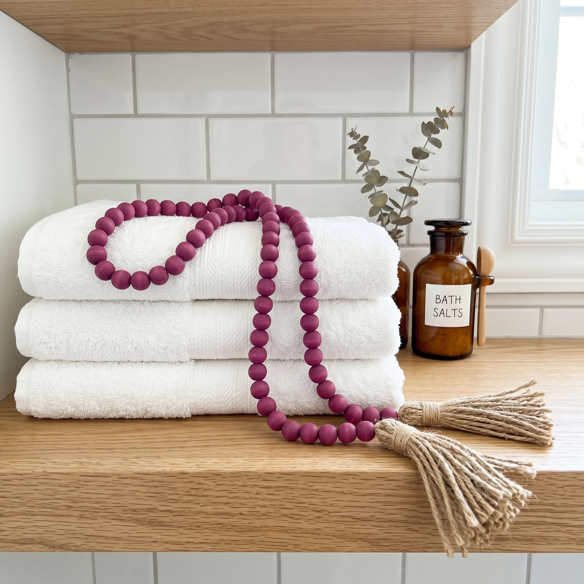 Wine Plum Wood Bead Garland on Bath towels in Contemporary Style Bathroom
